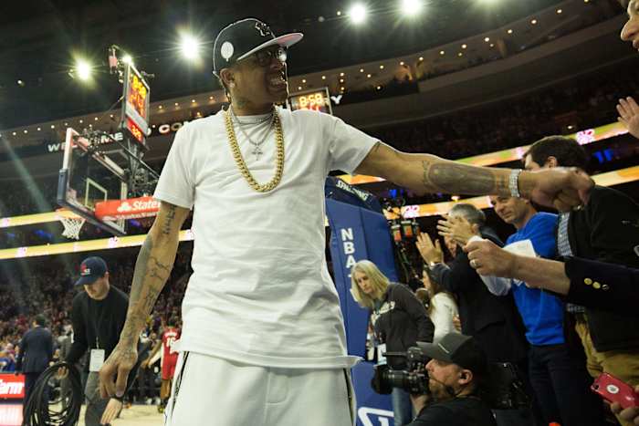 NBA Hall of Fame member and former Philadelphia 76ers Allen Iverson cheers on with fans in game two of the first round of the 2018 NBA Playoffs against the Miami Heat at Wells Fargo Center.